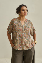 Model Tahnee wearing size 10 of the Flower Chain Slouch Top in colour Fleur, from the front, showing the whole outfit