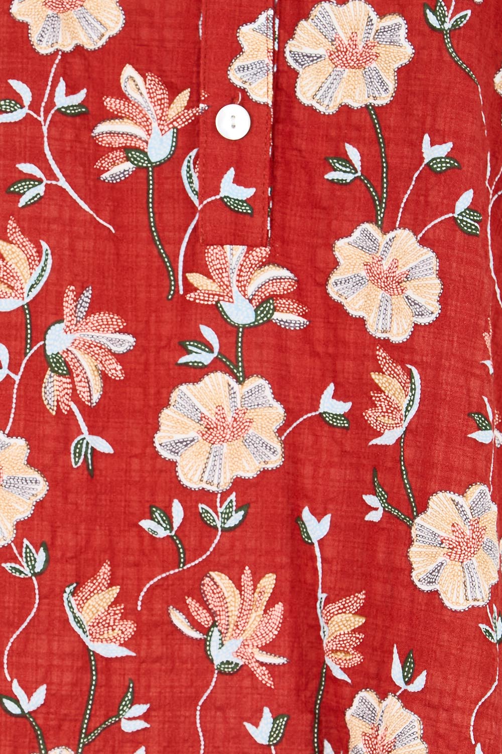 Product shot of the Flower Chain Slouch Top – Rust in colour Rust, showing detail