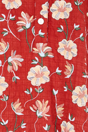 Product shot of the Flower Chain Slouch Top – Rust in colour Rust, showing detail