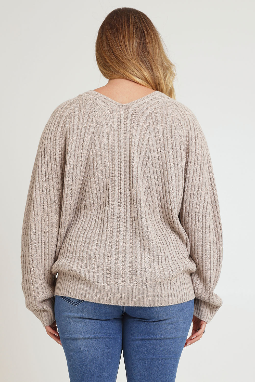 Model Chanel wearing size XL of the Ready And Cable Jumper in colour Sand, from the back