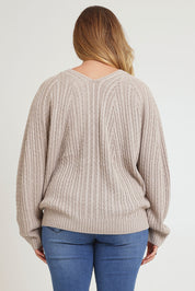 Model Chanel wearing size XL of the Ready And Cable Jumper in colour Sand, from the back