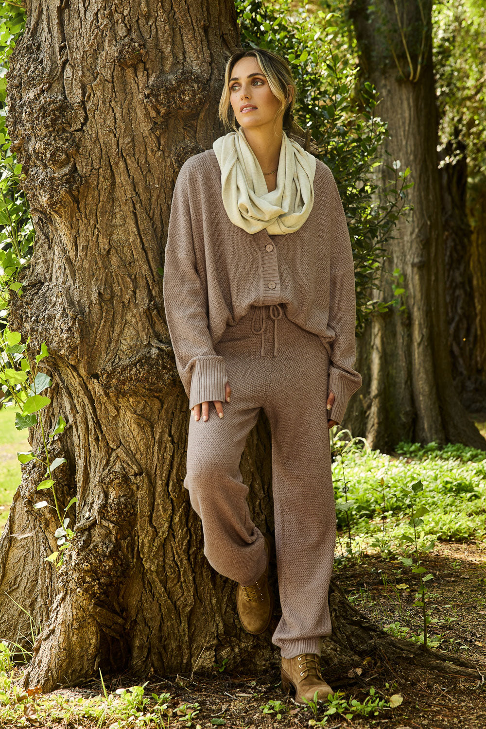 Model Tegan wearing size S of the Comfort Factor Moss Stitch Pant in colour Gumnut, from the front, showing the whole outfit