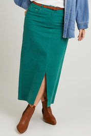 Model Laura wearing size 14 of the Carry Me With You Maxi Skirt in colour Forest (Green), from the front, cropped image