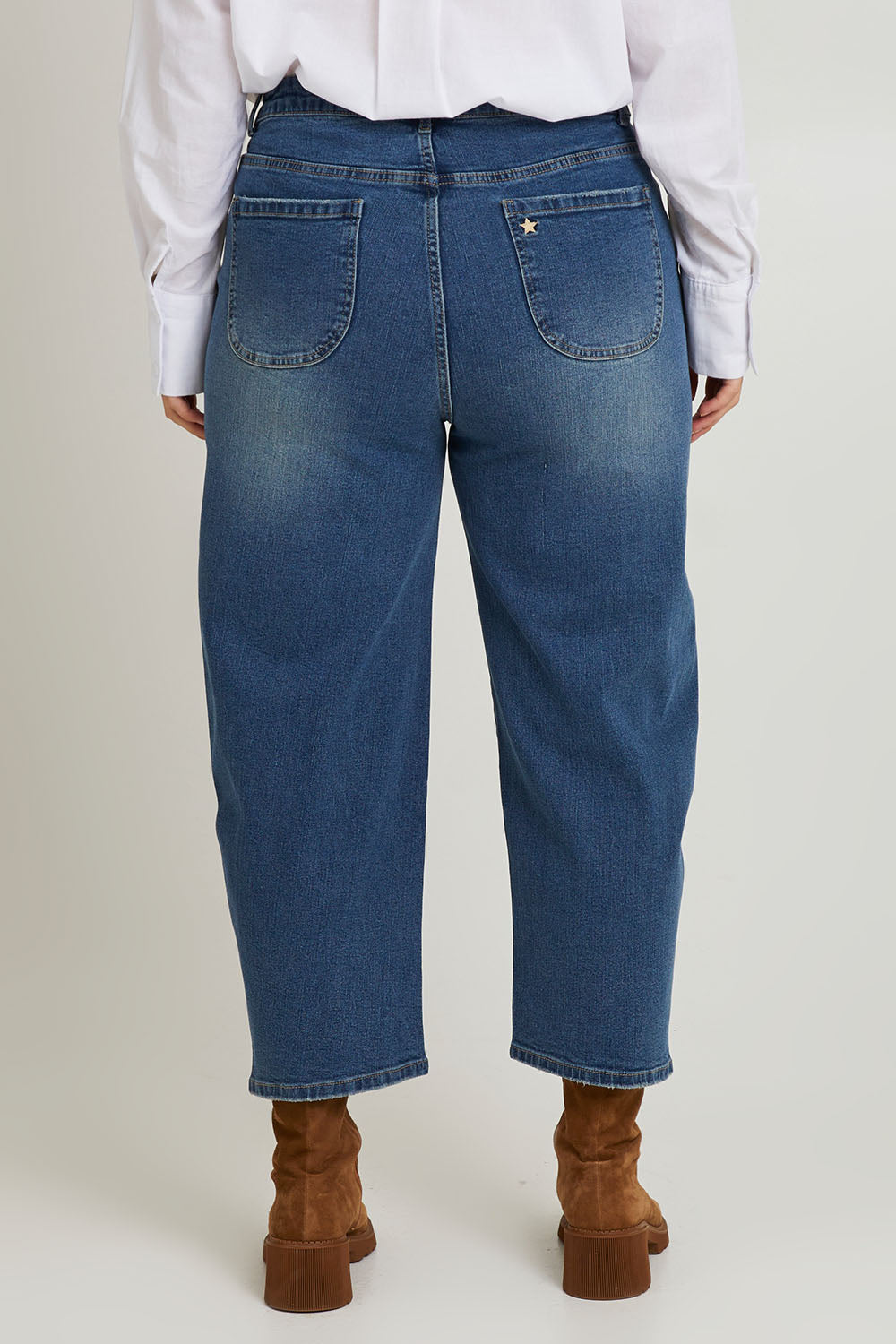 Model Laura wearing size 14 of the For All The Days Jeans in colour Denim (Blue), from the back