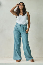 Model Tahnee wearing size 10 of the Blazing Trails Pants in colour Duskgreen (Green), from the front, showing the whole outfit