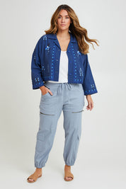Model Laura wearing size 14 of the Come Away With Me Embroidered Jacket in colour Bluehue (Blue), from the front, showing the whole outfit