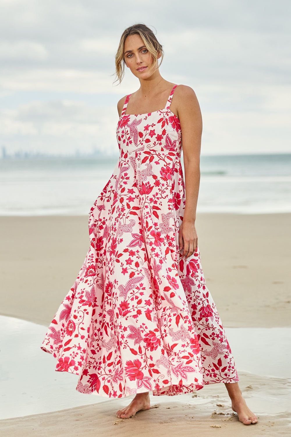 Model Tegan wearing size 10 of the Summer Fun Cotton Maxi Dress in colour Pinkred (Red), from the front, showing the whole outfit