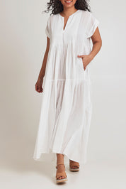 Model Terri-Leigh wearing size 14 of the Love Story Cotton Maxi Dress in colour White (White), from the front, cropped image