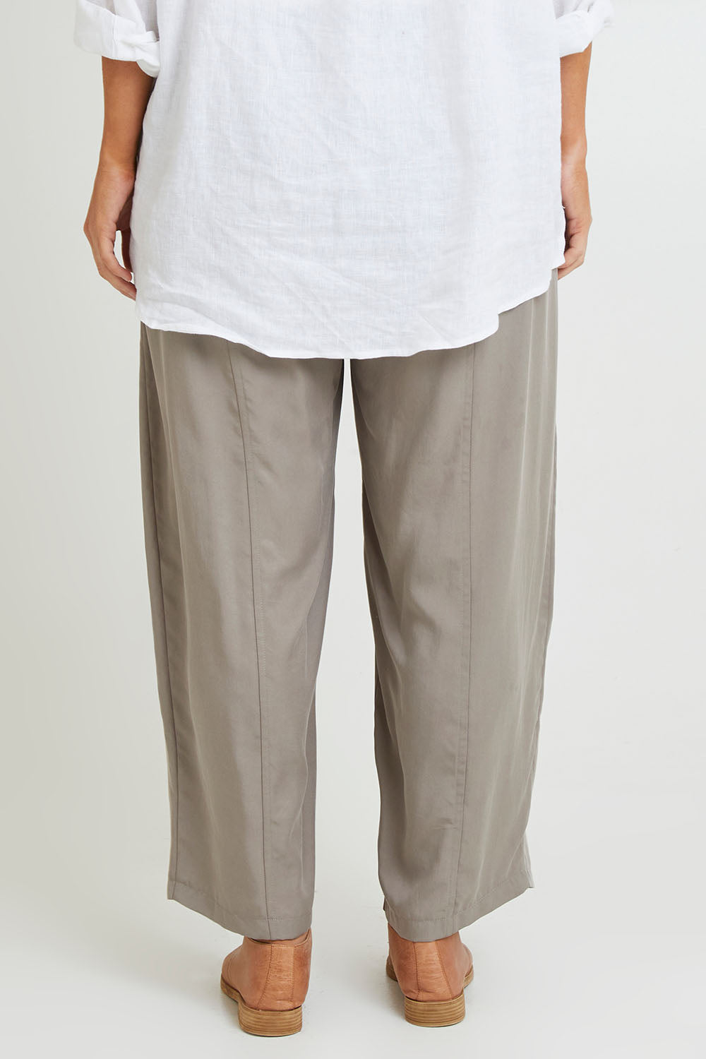 Model Laura wearing size 14 of the Feel Good Tencel Barrel Pants in colour Khaki (Green), from the back