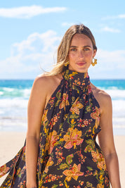 Model Tegan wearing size 10 of the Dream Daze Cotton Maxi Dress in colour Blackpink (Black), from the front, showing the whole outfit