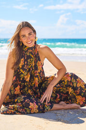 Model Tegan wearing size 10 of the Dream Daze Cotton Maxi Dress in colour Blackpink (Black), from the front, showing the whole outfit