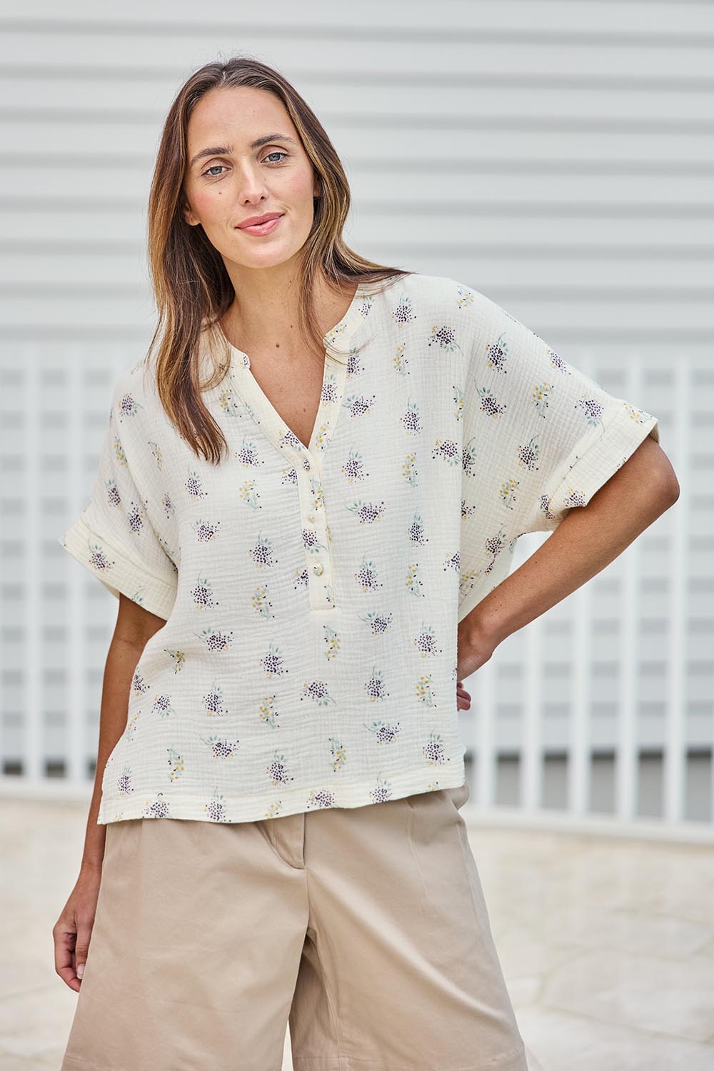 Model Tegand wearing size 10 of the Grandpa And Me Fleur Cotton Top – Creamfleur in colour Creamfleur, in a cropped view