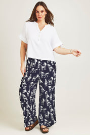 Model Jane wearing size 14 of the Grandpa And Me Cotton Top in colour White (White), from the front, showing the whole outfit