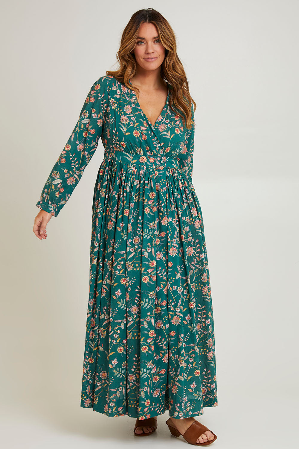 Model Laura wearing size 14 of the Divine Day Wrap Dress in colour Greenfleur (Green), from the front, showing the whole outfit