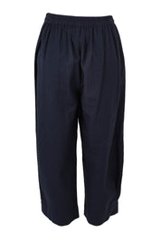 Product shot of the You Had Me At First Glance Pants in colour Indigo (Blue), from the back