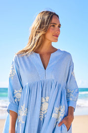 Model Tegan wearing size 10 of the Day Dreaming Embroidered Dress in colour Dustyblue (Blue), from the front, showing the whole outfit