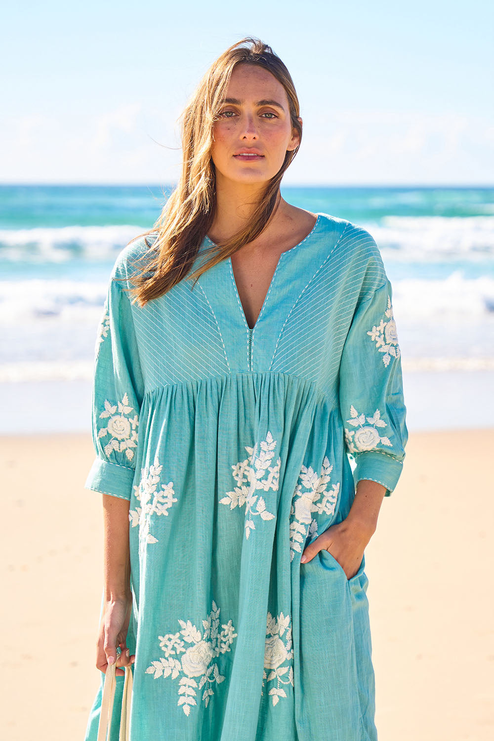 Model Tegan wearing size 10 of the Day Dreaming Embroidered Dress in colour Dustygreen (Green), from the front, showing the whole outfit