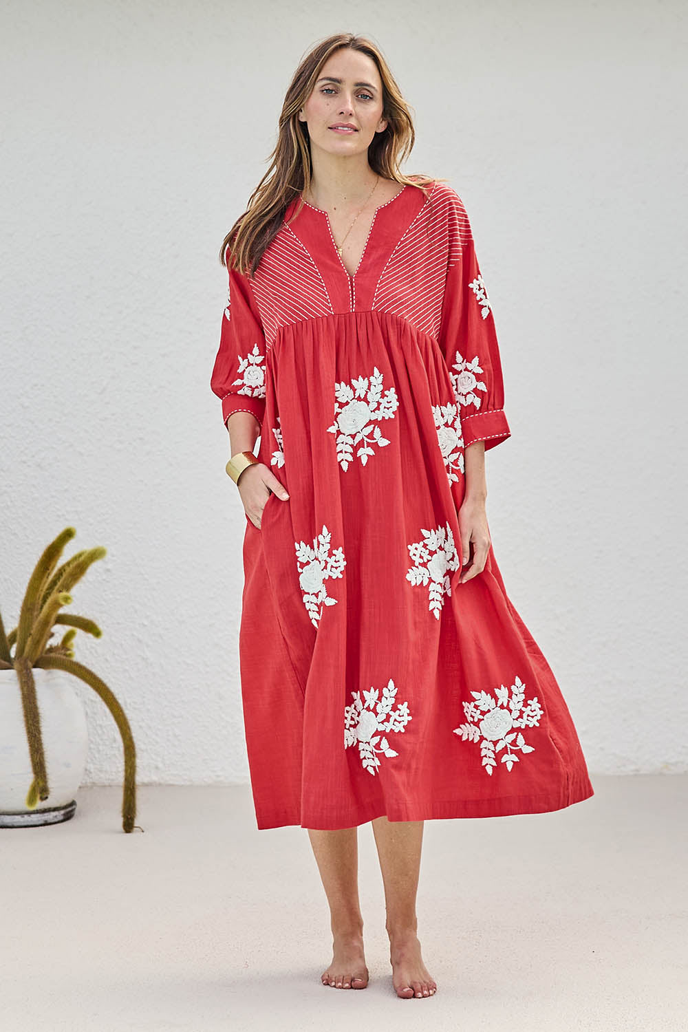 Model Tegand wearing size 10 of the Day Dreaming Embroidered Dress – Dustyred in colour Dustyred, from the front