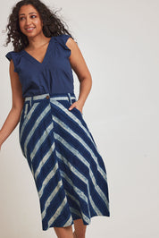 Model Terri-Leigh wearing size 14 of the Pocket Full Of Dreams Skirt in colour Stripe (Blue), from the front, cropped image