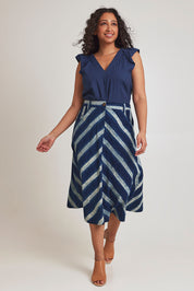 Model Terri-Leigh wearing size 14 of the Pocket Full Of Dreams Skirt in colour Stripe (Blue), from the front, showing the whole outfit