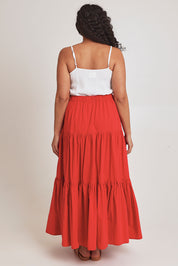 Model Terri-Leigh wearing size 14 of the Promenade Maxi Skirt in colour Rouge (Red), from the back