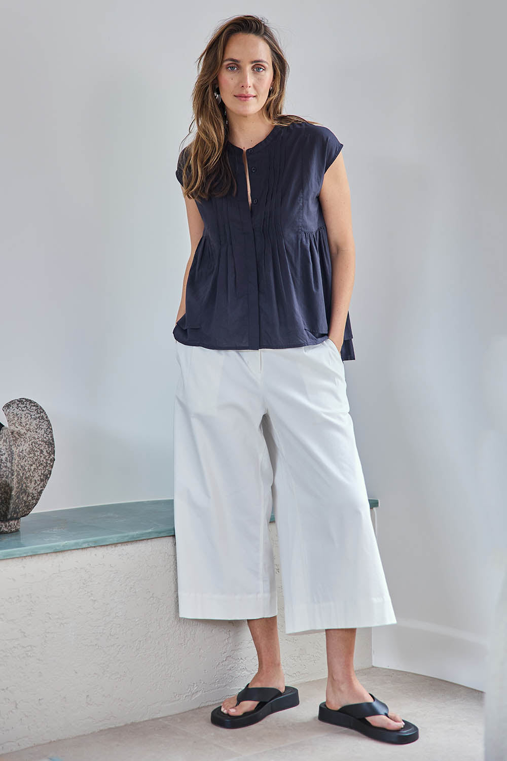 Model Tegand wearing size 10 of the Need You In My Life Cropped Pants - White in colour White, from the front