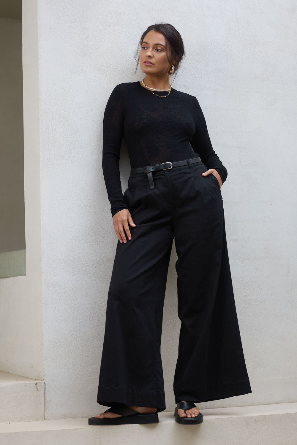 Model Tahnee wearing size 10 of the Need You In My Life Pants in colour Black (Black), from the front, showing the whole outfit