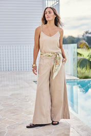 Model Tegand wearing size 10 of the Need You In My Life Pants - Wheat in colour Wheat, from the front