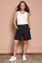 Model Katie wearing size 10 of the Need You In My Life Shorts in colour Black (Black), from the front, showing the whole outfit