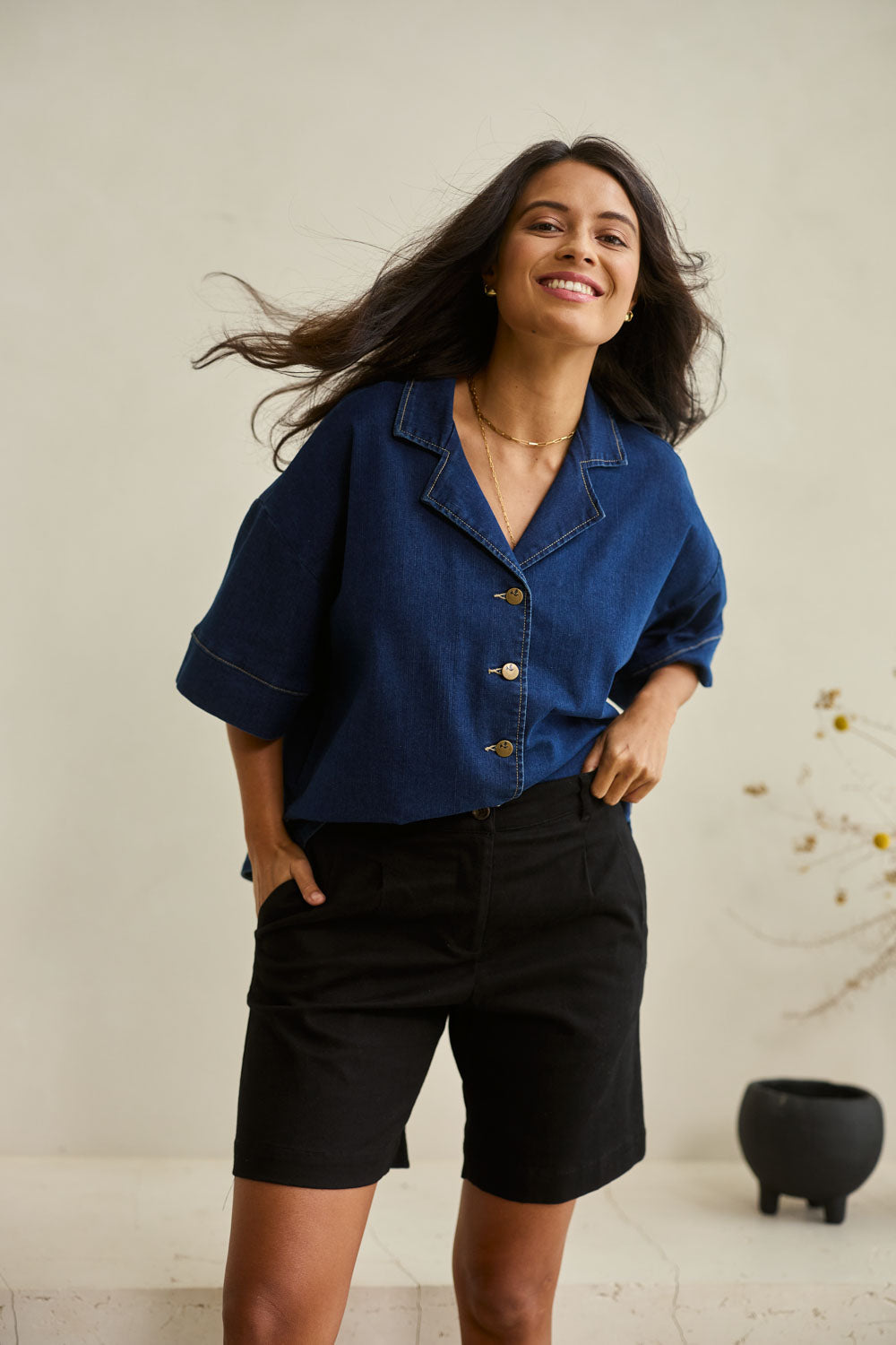 Model Tahnee wearing size 10 of the Need You In My Life Shorts in colour Black (Black), from the front, showing the whole outfit