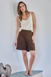 Model Tegand wearing size 10 of the Need You In My Life Shorts – Chocolate in colour Chocolate, from the front