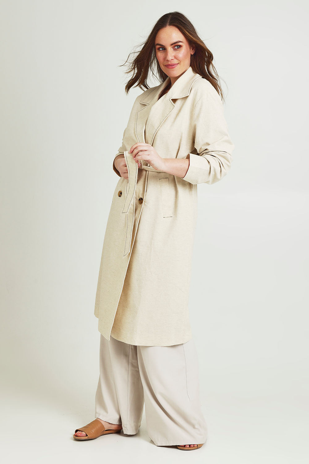 Model Jane wearing size 14 of the Summertime Love Linen Cotton Trench Coat in colour Natural, from the front, showing the whole outfit