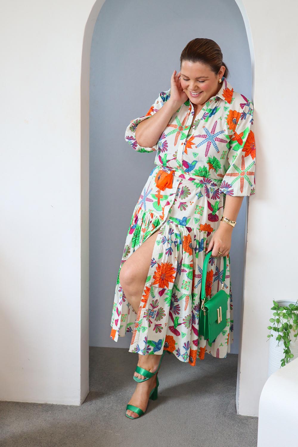 Model Stacey wearing size 14 of the Happy Gatherings Short Sleeved Cotton Dress in colour Brightbird, from the front, showing the whole outfit