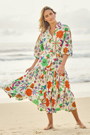 Model Tegan wearing size 10 of the Happy Gatherings Short Sleeved Cotton Dress in colour Brightbird, from the front, showing the whole outfit