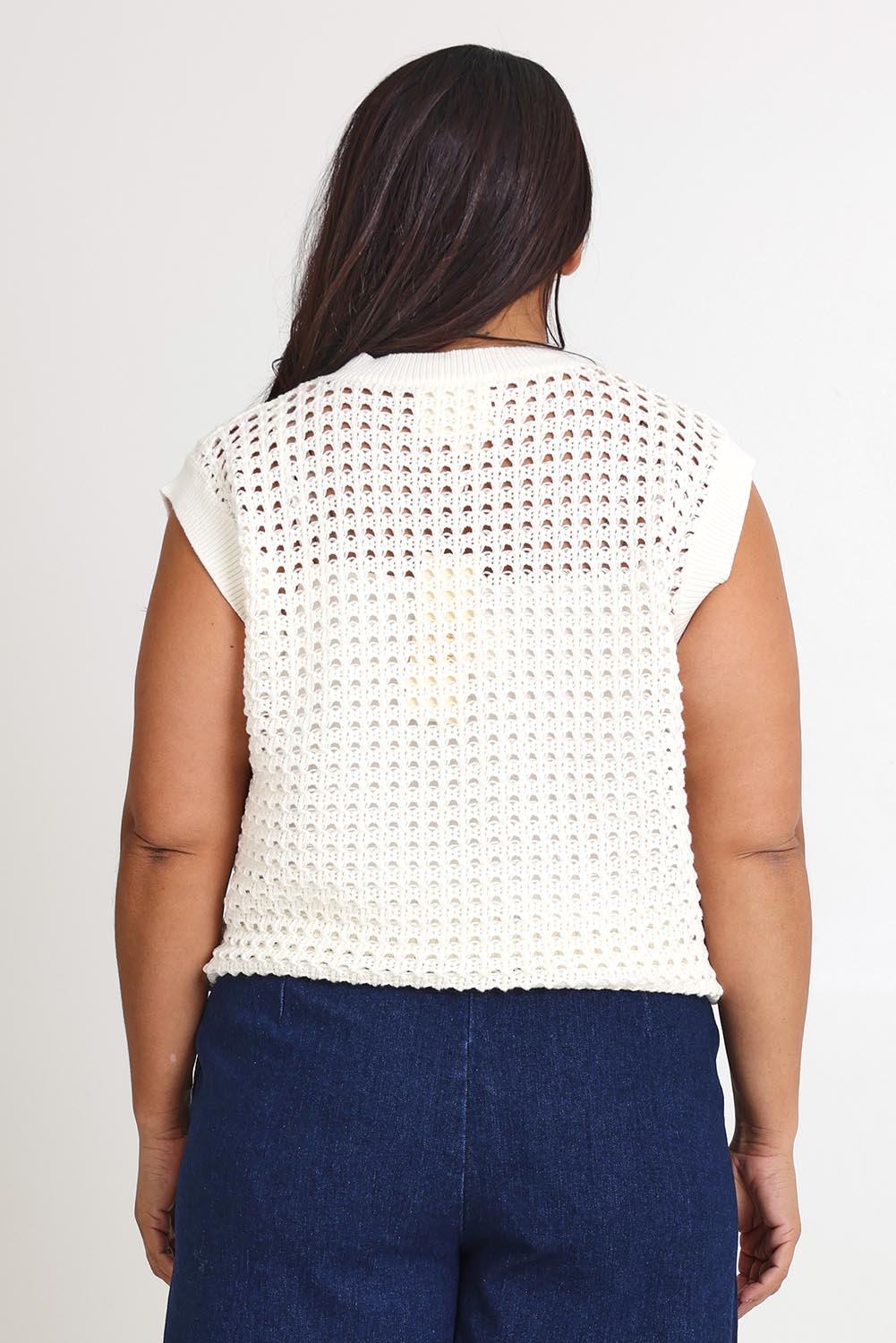 Model Ashleigh wearing size XL of the Love Language Cotton Vest in colour Milk (White), from the back