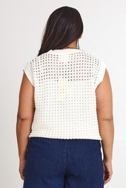 Model Ashleigh wearing size XL of the Love Language Cotton Vest in colour Milk (White), from the back