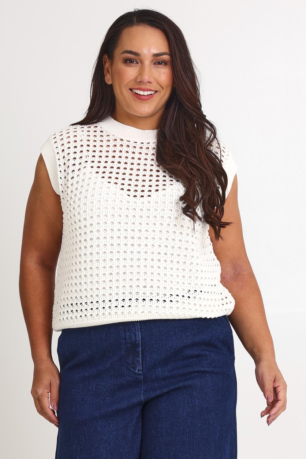 Model Ashleigh wearing size XL of the Love Language Cotton Vest in colour Milk (White), from the front, cropped image