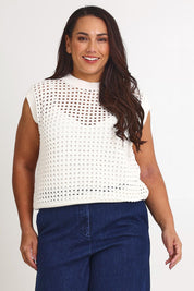 Model Ashleigh wearing size XL of the Love Language Cotton Vest in colour Milk (White), from the front, cropped image