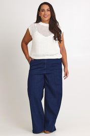 Model Ashleigh wearing size XL of the Love Language Cotton Vest in colour Milk (White), from the front, showing the whole outfit