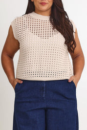 Model Ashleigh wearing size XL of the Love Language Cotton Vest in colour Natural, from the front, cropped image
