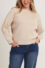 Model Chanel wearing size XL of the Always My Go To Jumper in colour Sand, from the front, cropped image