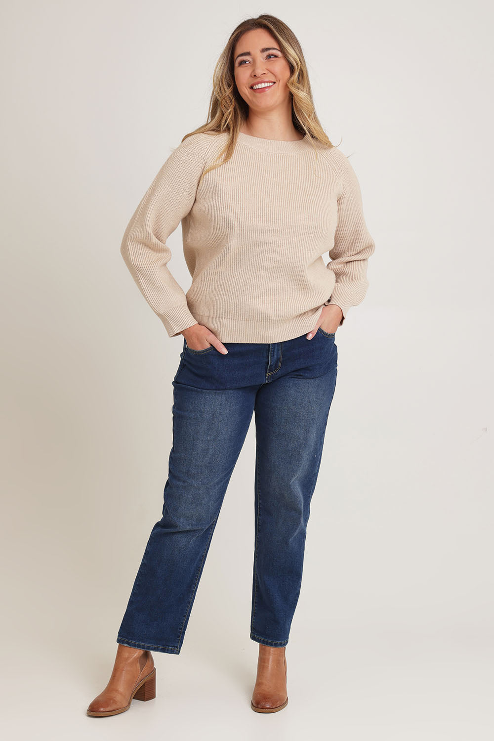Model Chanel wearing size XL of the Always My Go To Jumper in colour Sand, from the front, showing the whole outfit