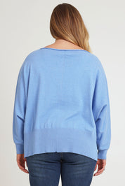Model Chanel wearing size XL of the Have You Seam Me Cotton Cashmere Jumper in colour Bluebird (Blue), from the back
