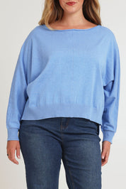 Model Chanel wearing size XL of the Have You Seam Me Cotton Cashmere Jumper in colour Bluebird (Blue), from the front, cropped image