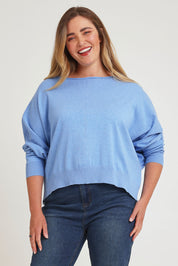 Model Chanel wearing size XL of the Have You Seam Me Cotton Cashmere Jumper in colour Bluebird (Blue), from the front, cropped image