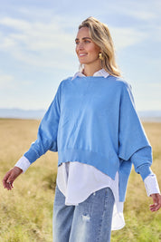 Model Tegan wearing size S of the Have You Seam Me Cotton Cashmere Jumper in colour Bluebird (Blue), from the front, showing the whole outfit