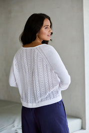 Model Tahnee wearing size S of the Pretty In Pointelle Linen Blend Cardi in colour Milk (White), from the front, showing the whole outfit