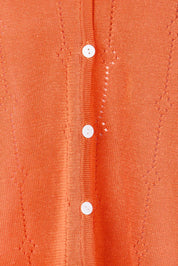 Product shot of the Pretty In Pointelle Linen Blend Cardi – Sunset in colour Sunset, showing detail