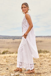 Model Tegan wearing size 10 of the Flying Free Cotton Top in colour White (White), from the front, showing the whole outfit