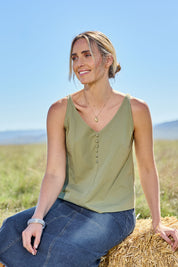 Model Tegan wearing size 10 of the Sweetie Pie Cotton Top in colour Khaki (Green), from the front, showing the whole outfit